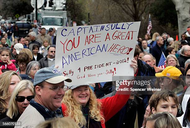 Susan Fleming, holds a sign proclaiming a common sentiment, january 24, 2009. More than one thousand people gathered on the Town Green in Danville,...