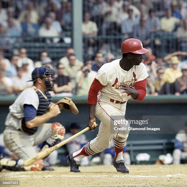 Outfielder Lou Brock, of the St. Louis Cardinals, at bat during Spring Training game against the New York Mets in March, 1968 in St. Petersburg,...