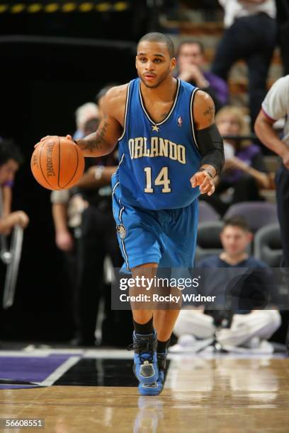 Jameer Nelson of the Orlando Magic brings the ball up court against the Sacramento Kings at the ARCO Arena on January 15, 2006 in Sacramento, CA....