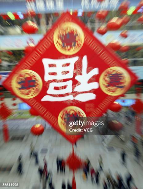 Huge Chinese Fu which means blessing and fortune hangs in a shopping mall on January 17, 2006 in Shenyang, Liaoning province, China. People across...