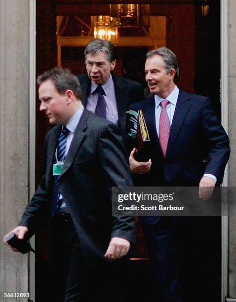 Britain's Prime Minister Tony Blair departs Downing Street watched by police officers and security officials on January 18, 2006 in London, England....