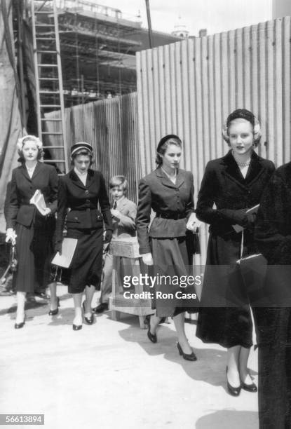 The royal maids-of-honour leave Westminster Abbey after Queen Elizabeth II's coronation rehearsal, 20th May 1953. From left to right, they are Lady...