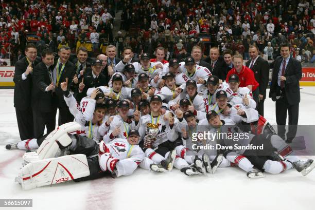 Members of Team Canada celebrate their victory against Team Russia during the gold medal game at the World Junior Hockey Championships at General...