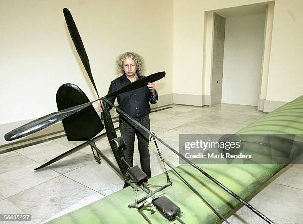 The artist Panamarenko poses for a photo in front of his work at the Panamarenko Exhibition at the Musee des Beaux Arts on January 18, 2006 in...