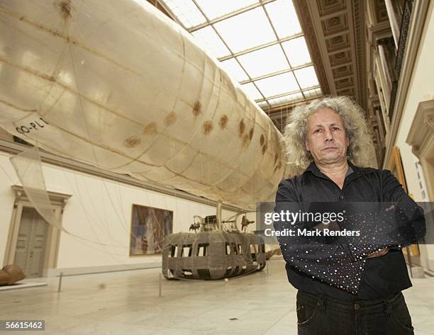 The artist Panamarenko poses for a photo in front of his work at the Panamarenko Exhibition at the Musee des Beaux Arts on January 18, 2006 in...