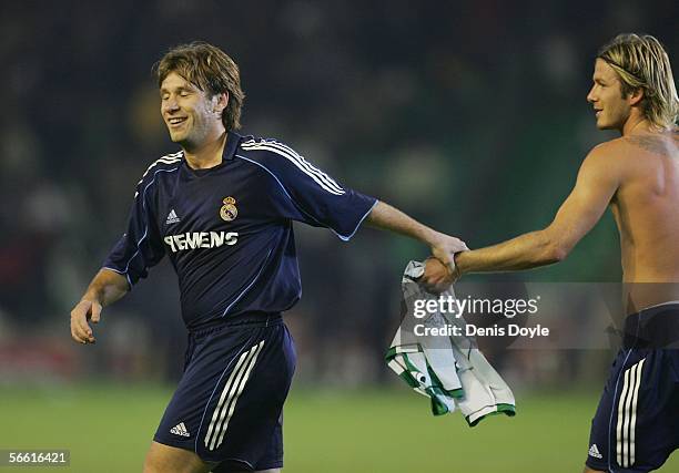 Antonio Cassano of Real Madrid celebrates with David Beckham at the end of a Copa del Rey quarter final, first leg, match between Real Betis and...