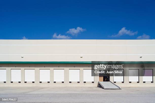 loading docks in industry - loading dock stock pictures, royalty-free photos & images