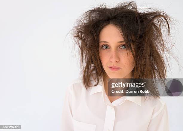 teenage girl with dishevelled hair - messy hair stock-fotos und bilder