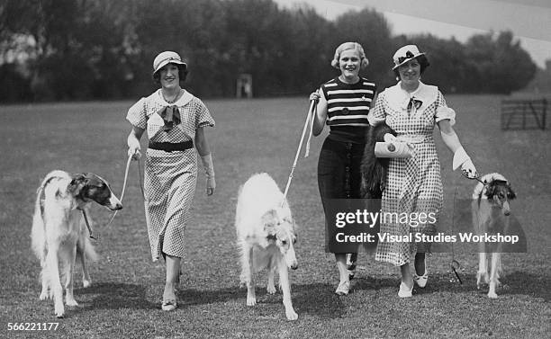 Organized by the Big Breeders Society, Big Dog Day was held in the gardens of Ranelagh, where three exhibitors posed with their Borzoi entries,...
