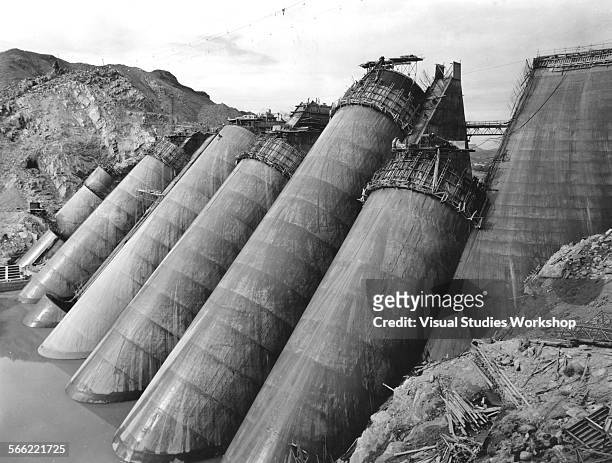 Concrete arches built at an angle and supported by buttresses, form the 270-foot Bartlett Dam, the tallest multiple arch dam in the world, which is...
