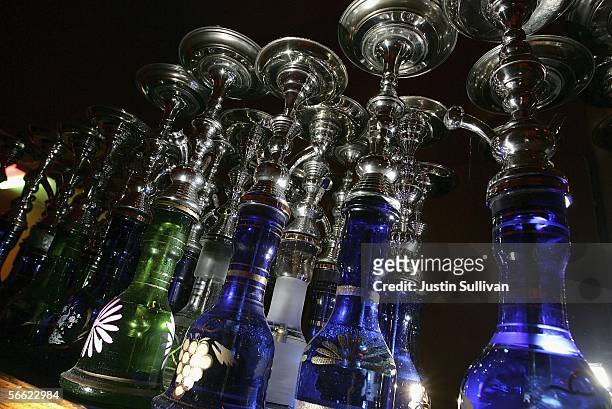 Hookah pipes are seen at the Hookah Nites Cafe January 18, 2006 in San Jose, California. The ancient Middle-Eastern practice of smoking flavored...