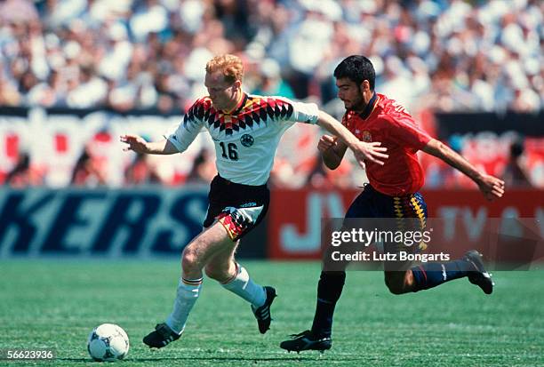 Matthias Sammer of Germany and Josep Guardiola of Spain in action during the World Cup match between Germany and Spain on June 21, 1994 in Chcago,...