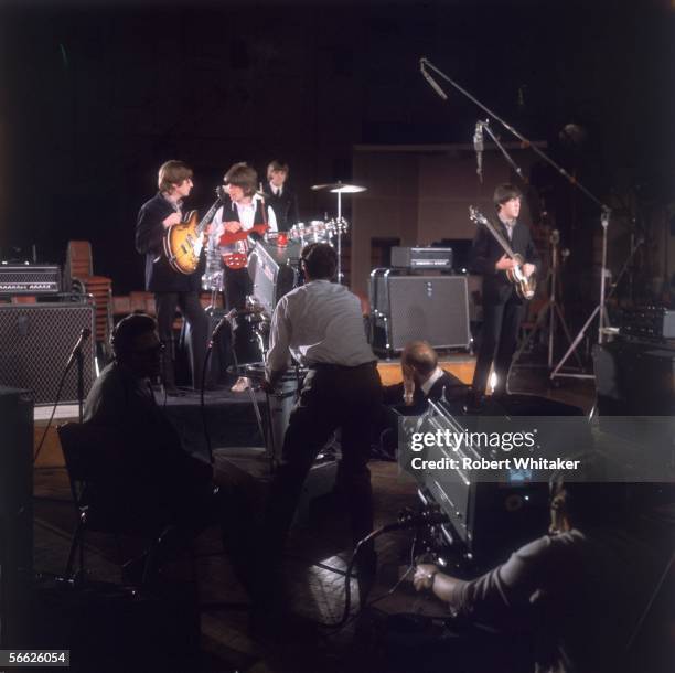 The Beatles, left to right, John Lennon, Ringo Starr, George Harrison and Paul McCartney, being filmed for a promotional clip during the Abbey Road...