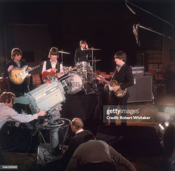 The Beatles, left to right, John Lennon, Ringo Starr, George Harrison and Paul McCartney, being filmed for a promotional clip during the Abbey Road...