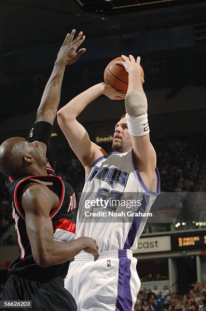 Brad Miller of the Sacramento Kings shoots against Ruben Patterson of the Portland Trail Blazers during the game at Arco Arena on December 26, 2005...