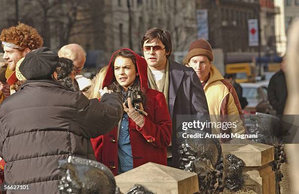 Lindsay Lohan and Jared Leto are seen on the movie set surrounded by the Dakota Fence during filming "Chapter 27" in front of the Dakota building in...