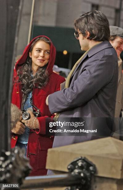 Lindsay Lohan and Jared Leto are seen on the movie set surrounded by the Dakota Fence during filming "Chapter 27" in front of the Dakota building in...