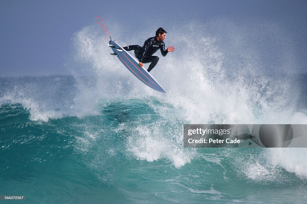 Surfer , surfing a big wave.