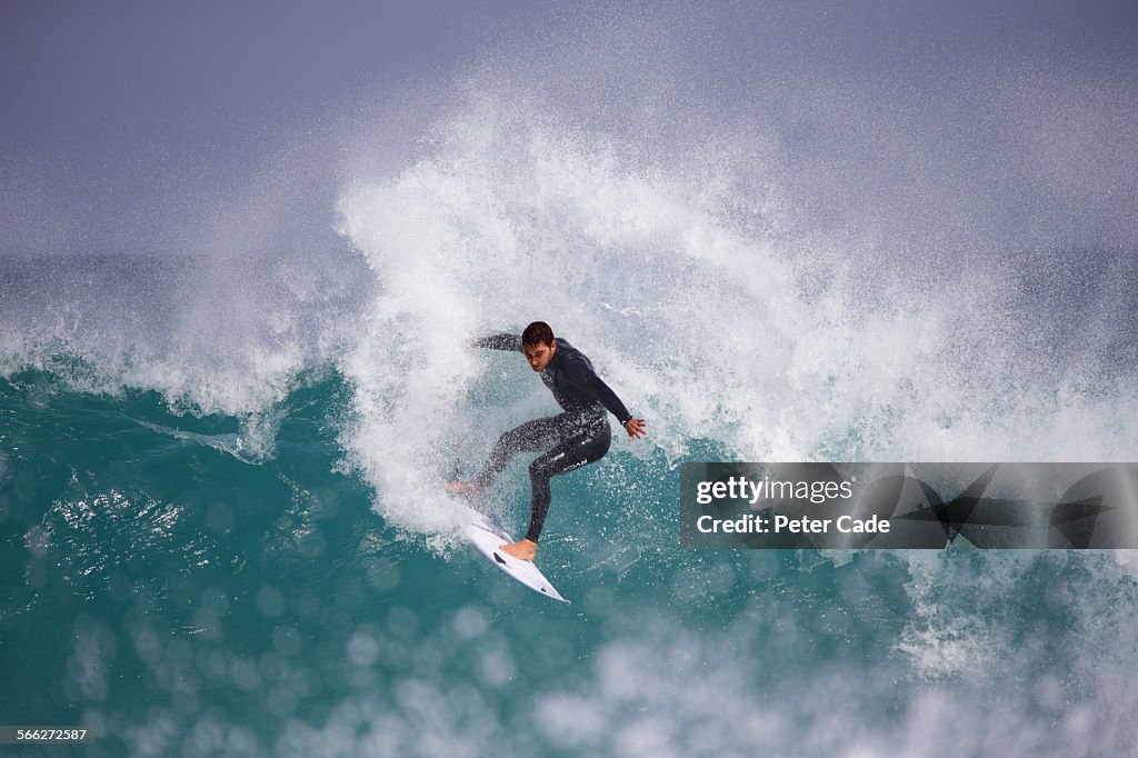 Surfer , surfing a big wave.