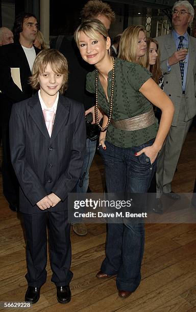 Tv presenter Ellie Crisell with one of the boys that play Billy Elliot in the musical attend the Critics' Circle National Dance Awards 2005,...