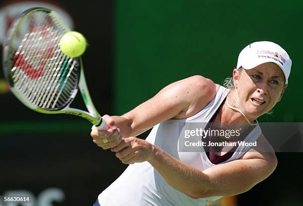 Trudi Musgrave of Australia plays a backhand in her doubles match with Nathan Healey of Australia against Jim Thomas of the USA and Bryanne Stewart...