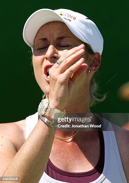 Trudi Musgrave of Australia reacts after a point in her doubles match with Nathan Healey of Australia against Jim Thomas of the USA and Bryanne...