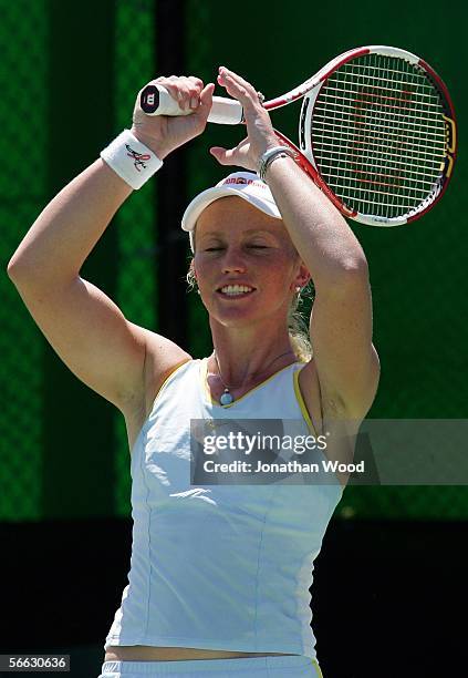 Bryanne Stewart of Australia reacts after a point in her doubles match with Jim Thomas of the USA against Trudi Musgrave and Nathan Healey of...