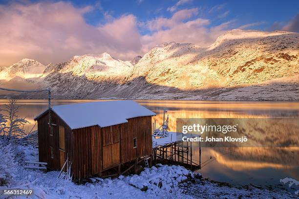 fishing shed in winter fjord - troms fylke stock pictures, royalty-free photos & images