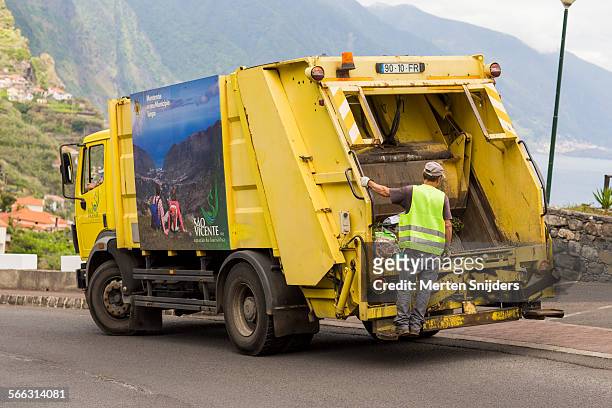 garbage truck of são vicente region - garbage truck stock pictures, royalty-free photos & images