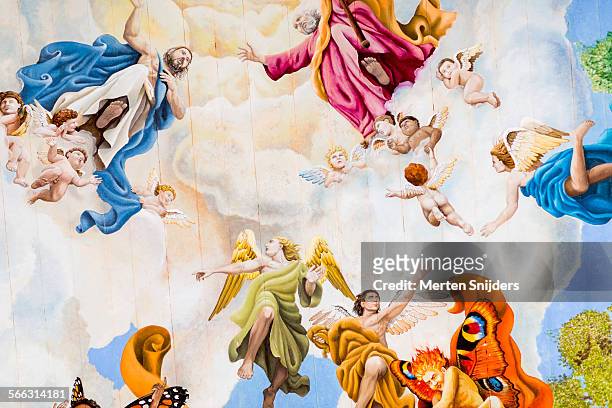 large fresco's on church ceiling - angel wings foto e immagini stock