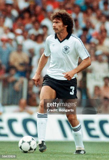Paul Breitner of Germany in action during the World Cup final match between Germany and Italy at the Santiago Bernabeu Stadium on July 11, 1982 in...