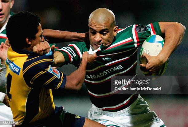 Tom Varndell of Leicester is tackled by Breyton Paulse of Clermont Auvergne during the Heineken Cup Pool 3 match between ASM Clermont Auvergne and...