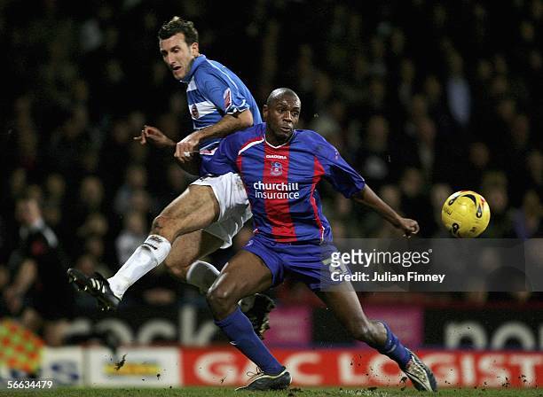 Glen Little of Reading battles with Emmerson Boyce of Palace during the Coca-Cola Championship match between Crystal Palace and Reading at Selhurst...