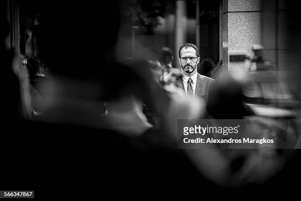 Reporter at the entrance of the Greek Finance Ministry waiting for the former Greek Finance Minister Yanis Varoufakis to exit the building the day of...