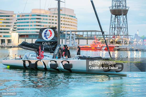 Sailors arriving at Barcelona harbor from New York crossing the Atlantic Ocean.