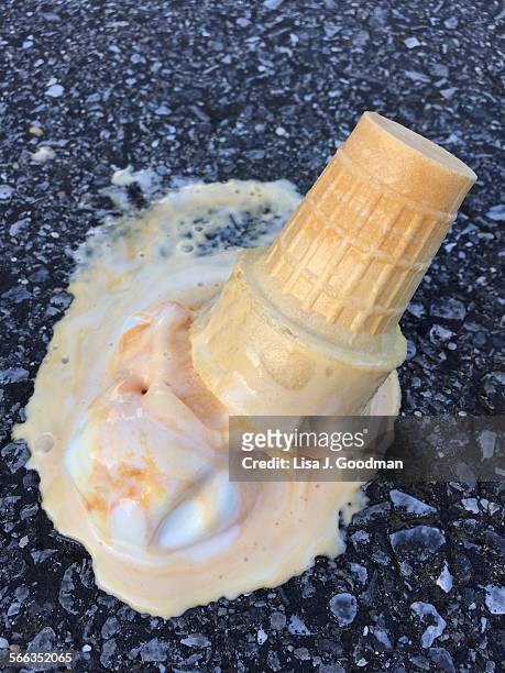 ice cream accidents - orange sorbet stock pictures, royalty-free photos & images
