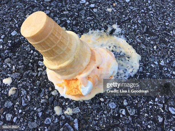 ice cream accidents - orange sorbet stock pictures, royalty-free photos & images