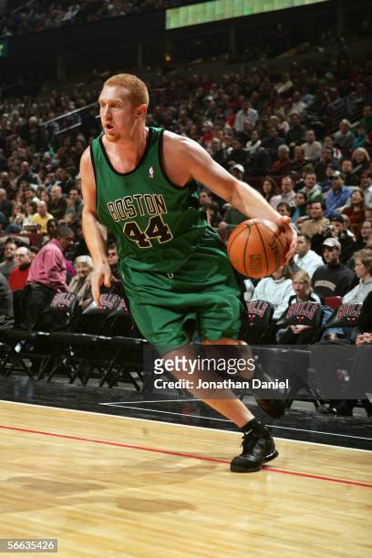 Brian Scalabrine of the Boston Celtics drives against the Chicago Bulls during the game at the United Center on December17, 2005 in Chicago,...