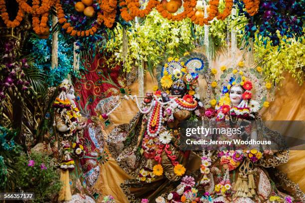 krishna and radha statues decorated in hindu temple - mathura stock pictures, royalty-free photos & images