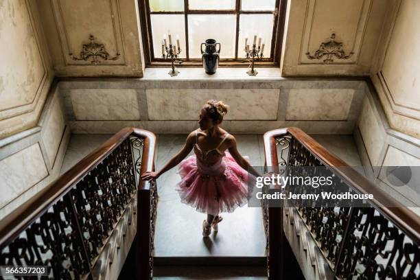 hispanic ballet dancer standing on staircase - havana art stock pictures, royalty-free photos & images