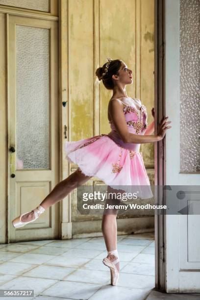 hispanic ballet dancer posing in dilapidated mansion - havana door stock pictures, royalty-free photos & images