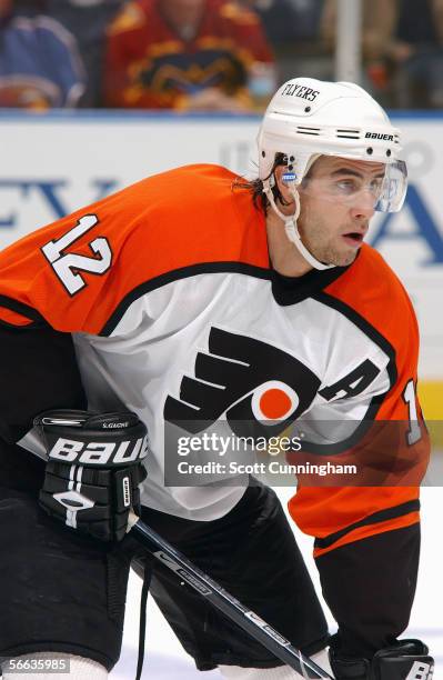 Simon Gagne of the Philadelphia Flyers looks on against the Atlanta Thrashers at Philips Arena on December 28, 2005 in Atlanta, Georgia. The Flyers...