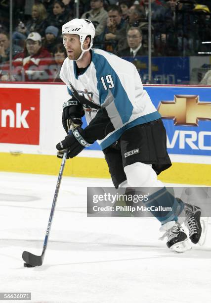 Joe Thornton of the San Jose Sharks skates with the puck during the game against the Ottawa Senators on January 12, 2006 at the Corel Centre in...