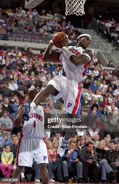Ben Wallace of the Detroit Pistons grabs a rebound during the game with the Toronto Raptors on December 27, 2005 at the Palace of Auburn Hills in...
