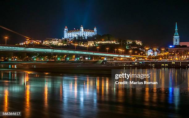 bratislava castle, bridge and danube, slovakia. - slovakia castle stock pictures, royalty-free photos & images