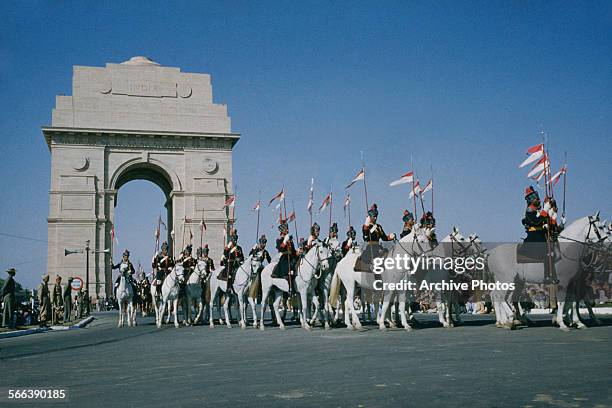 Military parade past India Gate on the Rajpath in Delhi, India, possibly the Delhi Republic Day parade, circa 1965.