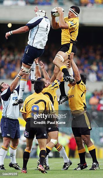 Corniel van Zyl of the Cheetahs contests the line out with John Welborn of the Western Force during the first Super 14 trial match between the...