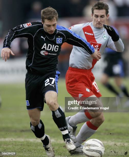 Miroslav Klose of Werder and Alexander Laas of Hamburg fight for the ball during the friendly match between Werder Bremen and Hamburger SV on January...