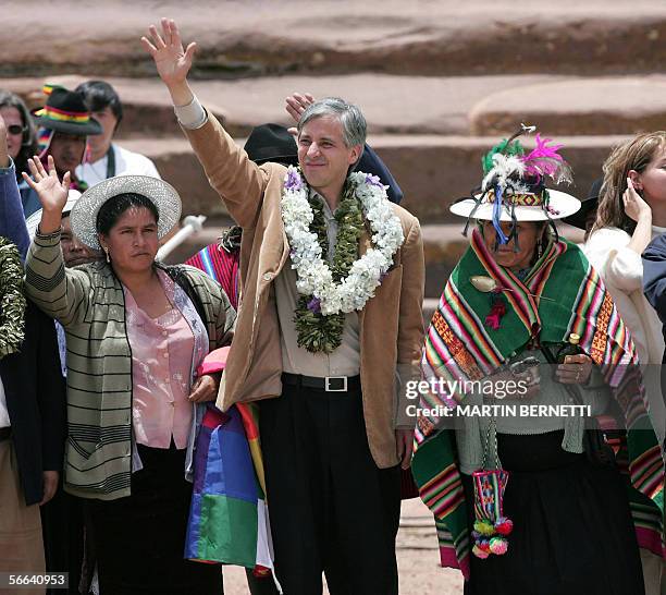 Bolivia's Vice President-elect Alvaro Garcia waves to supporters durgin the ceremony where President-elect Evo Morales was crowned as supreme chief...