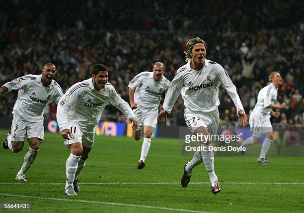David Beckham of Real Madrid celebrates his goal with teammates during a Primera Liga match between Real Madrid and Cadiz at the Santiago Bernabeu...
